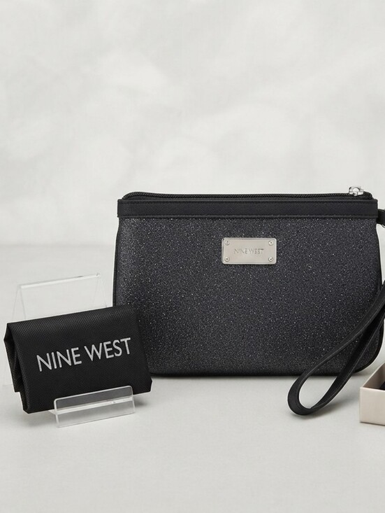 Nine West Handbags - Nine West Black Textured Wristlet with Logo Plaque